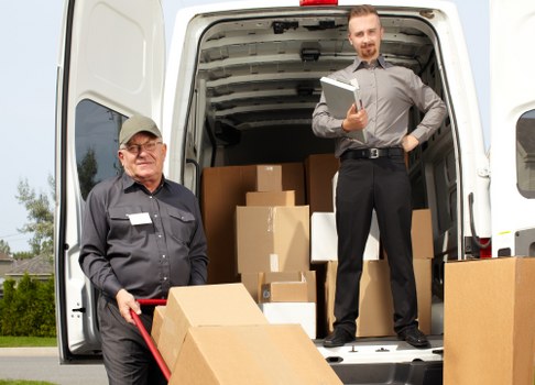Removal van and moving boxes prepared for a South Lambeth house move