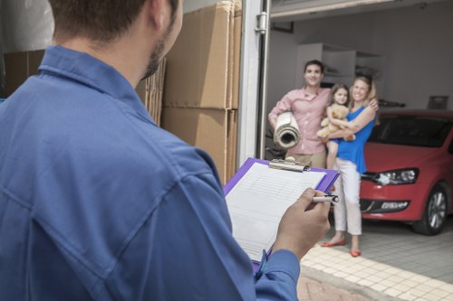 Removal team handling items carefully during a move