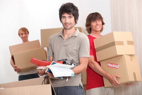 Professional team handling office furniture during a South Lambeth relocation