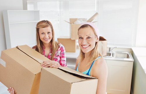 Preparing furniture for transport during a South Lambeth removals job